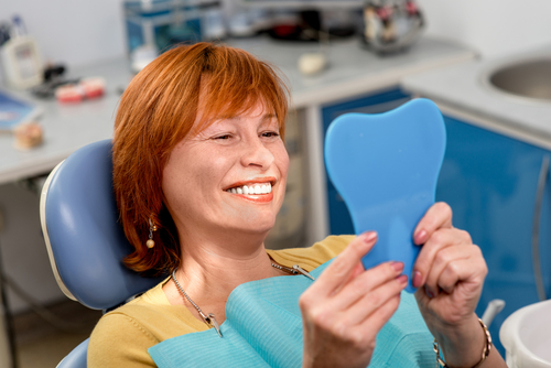 woman smiling at dental office